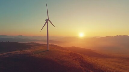Fototapeta premium Wind turbine at dawn, blades turning, misty landscape, soft light