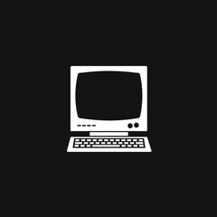 Minimalist icon of a vintage computer on a black background, symbolizing retro technology.