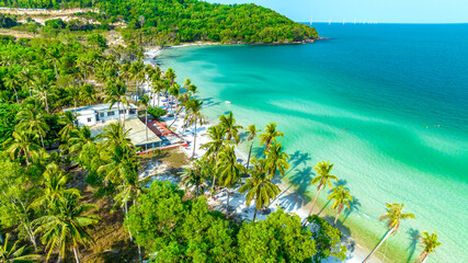 Naklejka na ściany i meble Aerial view of Phu Quoc Island Coastal Scenery (Khem Beach), Vietnam. Emerald Bay, a Popular Tourism Destination for Summer Vacation in Southeast Asia, with Tropical Climate and Beautiful Landscape.