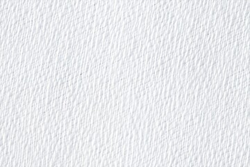Texture of white batiste cotton fabric with a subtle, textured surface. The image showcases the fine details and patterns of the paper, ideal for backgrounds or design elements.