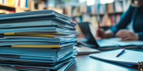 academic journals stacked on a desk, with a researcher highlighting important sections for a literature review