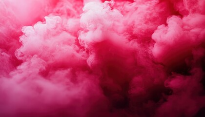 Fototapeta premium Vibrant pink smoke swirls elegantly, creating a surreal atmosphere perfect for artistic and creative projects.