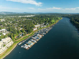 A view of a river with a town on the bank