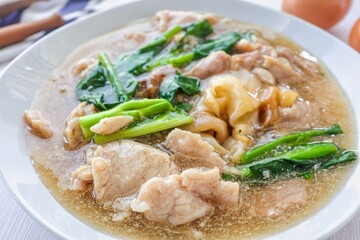Fried Noodle With Pork in thick gravy,Thai called rad nah moo, thai food, asian food, close up