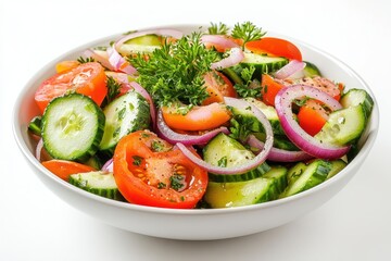 A fresh vegetable salad with tomatoes, cucumbers, onions, and herbs in a bowl.