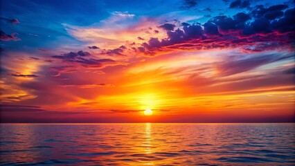 Fototapeta premium Vibrant gradient sunset over the horizon with fading colors