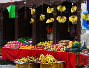 Various Fruits at a Local Market in Kathmandu, Nepal. A vibrant display of fresh, colorful fruits showcases the rich agricultural diversity and local flavors of Nepal.