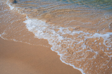 Waves from the turquoise waters of Nha Trang beach, there are no people.