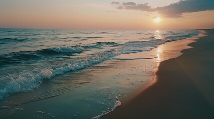 A serene beach at sunset, with waves gently lapping against the shore, reflecting the importance of finding moments of peace and relaxation for mental well-being.