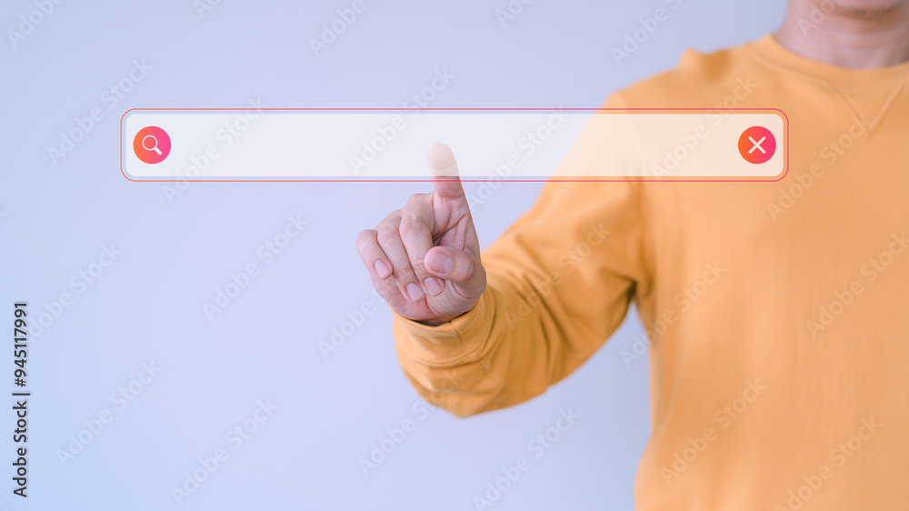 Fototapete User finger presses the search button on a virtual screen to retrieve data. Concept highlights using a searching console with your website, Search technology involving SEO.