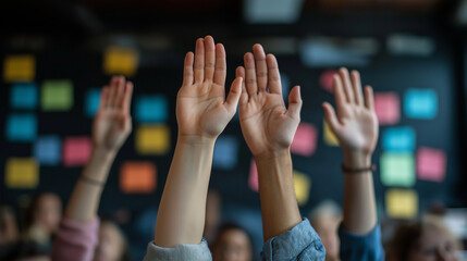 Business people, team and hands raised for question, vote or feedback in conference room meeting closeup. Group, crowd and palm for answer, volunteer and audience ask in training seminar for learning