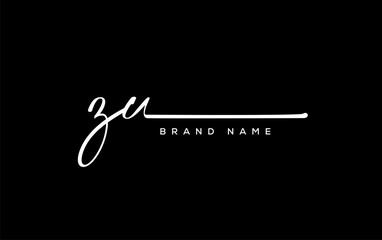 ZU letter beauty handwriting vector logo.