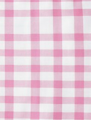 Experience warmth with a soft pink gingham pattern, inviting the comfort of vintage fabric ideal for cozy moments.