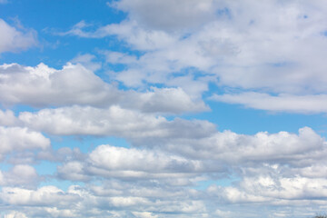 White clouds against a blue sky