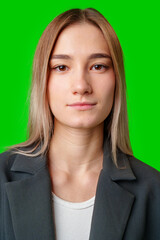 Young Woman in Black Blazer Against Green Screen