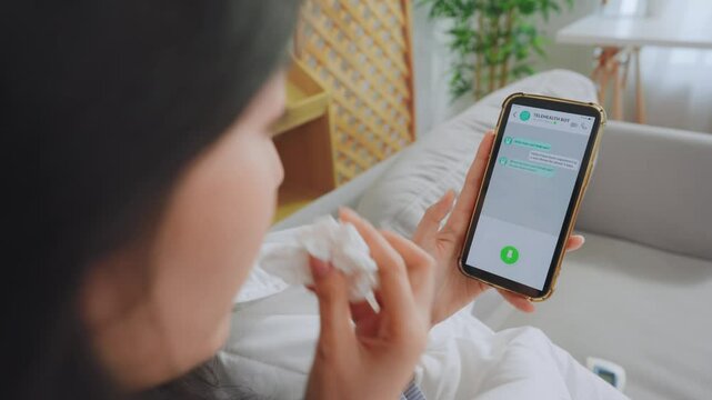 Close up of woman patient using phone apps consulting doctor online.