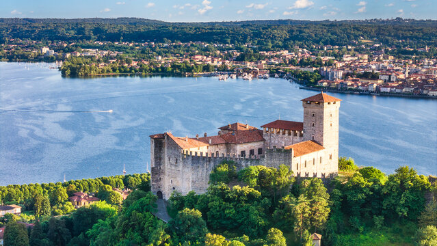 Aerial view close up of Rocca Borromea of Angera city with Arona in the background, Angera, Varese province, Lombardy, Italy 