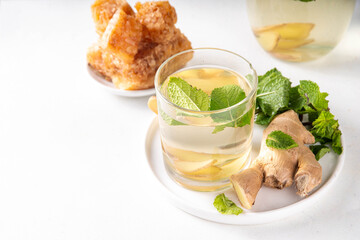 Sweet Ginger Mint Cooler with honey