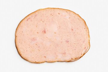 Slice of Bologna sausage on white background.