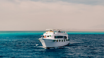 tourists on white boats in the Red Sea Egypt