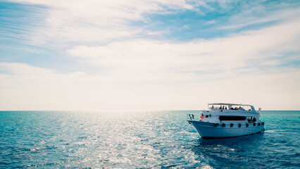 white cruise tourist boat in the Red Sea in Egypt