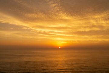 Naklejka premium sunset over the ocean
