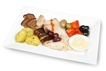 Fish fillet with assorted vegetables on plate