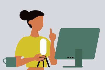 The girl is working on the monitor.