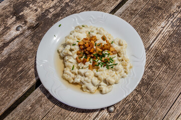 National dish of Slovakia - Bryndzove halusky (potato dough lumps with a sheep cheese and bacon)