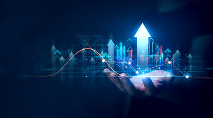 Businessman holding growth graph of business. Successful business, growth strategy and achieving goals with the rising arrow. Business strategy development and growing growth plan.