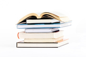 pile of books on a white background