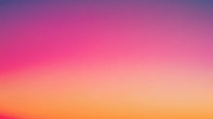 Stunning sunset with vibrant pink and orange hues over a calm horizon at twilight