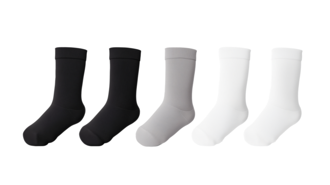 Three pairs of socks in different colors arranged separately isolated on white or background