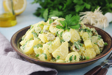 A bowl with Greek potato salads