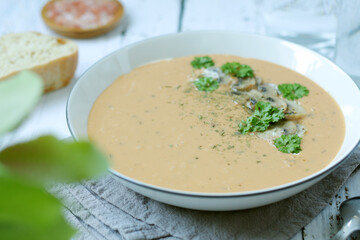 A bowl with mushroom cream soup