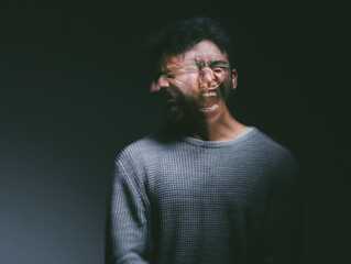 Anxiety, screaming and man in studio with double exposure for mental health, psychology or bipolar...