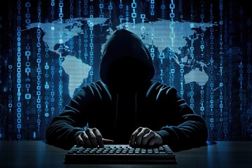 Hacker using computer with blue digital world map in the background. 