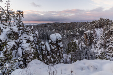 Winter view of snow covered Prachovske skaly rocks in Cesky raj (Czech Paradise) region, Czech Republic