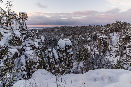Winter view of snow covered Prachovske skaly rocks in Cesky raj (Czech Paradise) region, Czech Republic