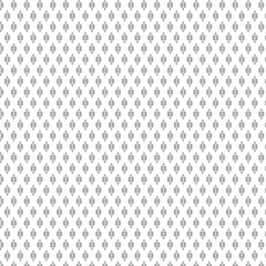 Seamless vector pattern of white dots creates a subtle texture on a white backdrop