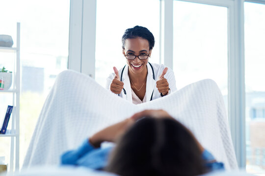 Thumbs up, patient and gynecologist for consultation, diagnosis or successful in pap smear or check up. Female people, healthcare and medic for cervical exam, support or wellness clinic with feedback
