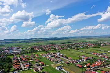 Aerial view of residential neighborhood, village houses in a plain