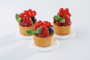 Summer fruits. Seasonal delicious tart against white background