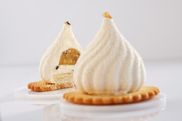 On the yellow cookie. Sweet cakes on the white surface