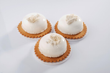 Lot of sugar. Sweet cakes on the white surface