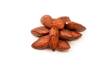 A group of caramelized almonds isolated on a white background.