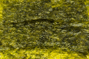 Tasty nori seaweed as a background. Top view.
