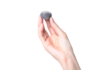 A woman's hand holds a mochi candy, Mochi - Japanese dessert, sweets. Isolated on white or transparent background photo