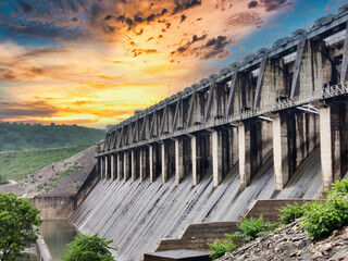 Picture of gates of Mahi Dam situated at Banswara shot against a beautiful sunset
