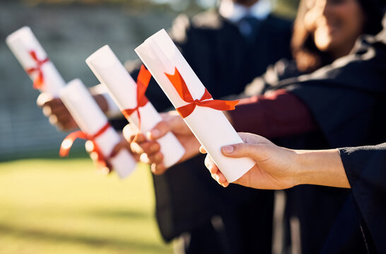 People, graduation and hands with paper at university for education, success and course achievement. Campus, friends and students with completion of diploma for knowledge, learning and academic award